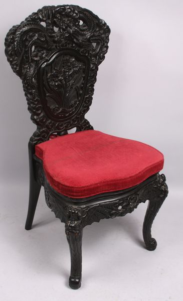 Appraisal: Heavily carved Chinese side chair h x w x d