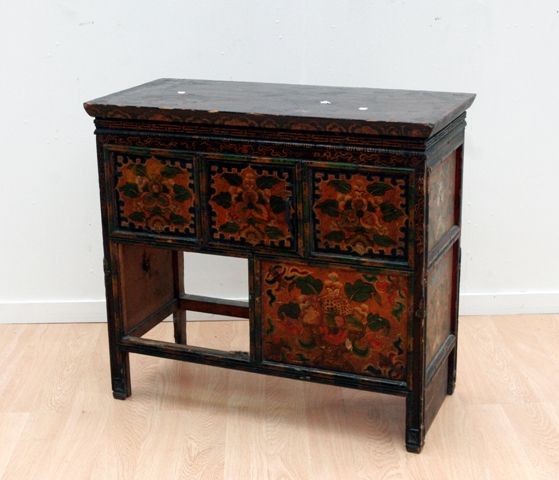 Appraisal: A th century Tibetan cupboard of five panels damaged household