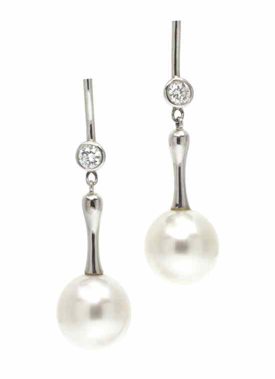 Appraisal: A Pair of Platinum Cultured South Sea Pearl and Diamond