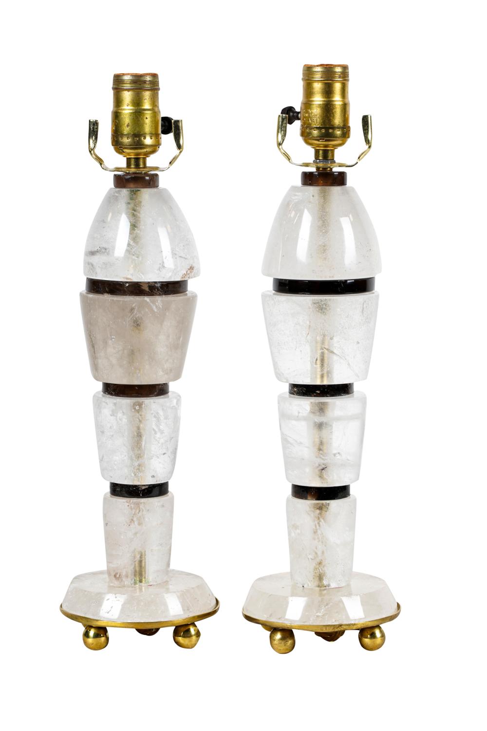 Appraisal: PAIR ART MODERNE STYLE ROCK CRYSTAL LAMPSwith metal mounts each