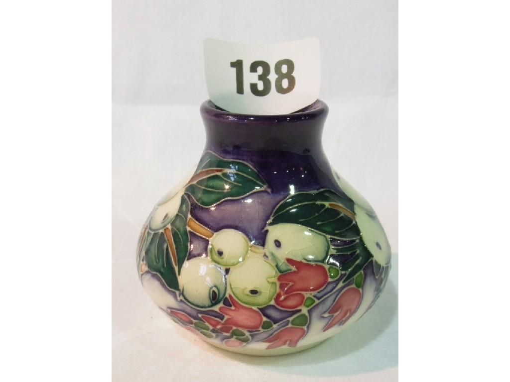 Appraisal: A small Moorcroft vase of squat circular form with painted