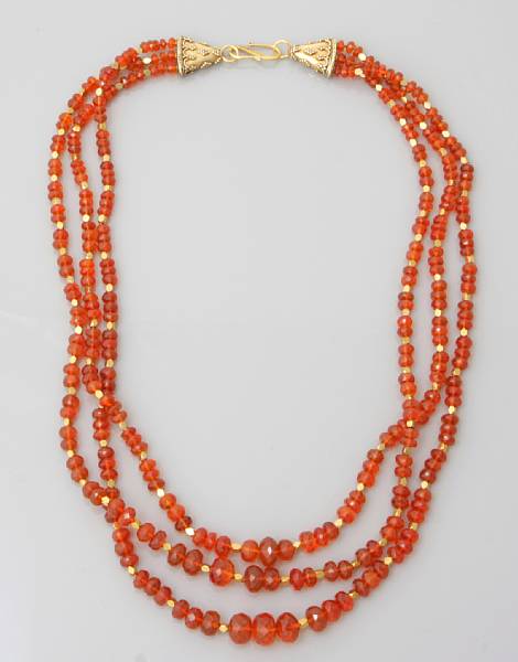 Appraisal: Natural History and Gemstones A three-strand necklace consisting of gem-quality