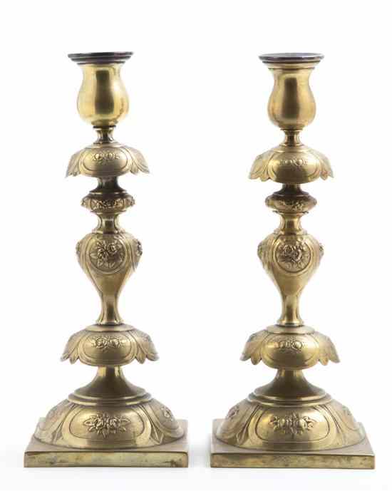 Appraisal: A Pair of Polish Brass Candlesticks Norblin Co Warsaw each