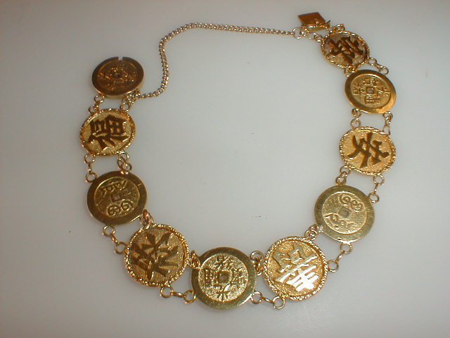 Appraisal: A Chinese coin bracelet in yellow metal cm length with