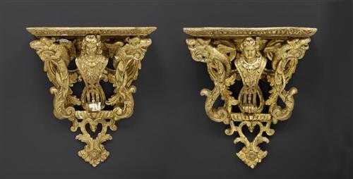 Appraisal: PAIR OF HANGING CONSOLES AU MASCARON R gence style Paris