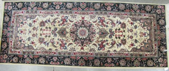 Appraisal: A handmade Oriental runner cream field with traditional design green