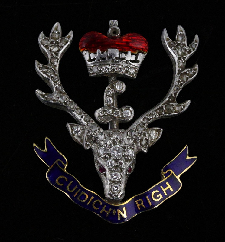 Appraisal: A gem-set and enamel regimental brooch for the Queen's Own