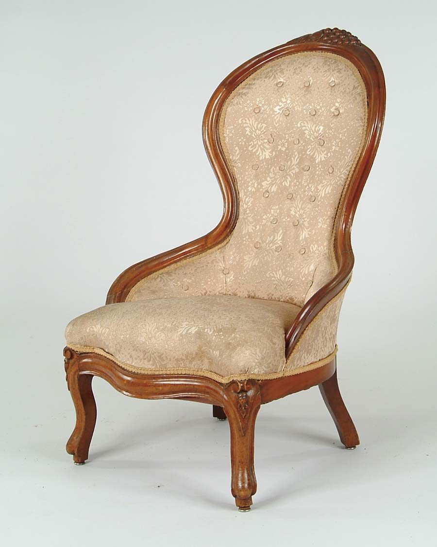 Appraisal: VICTORIAN WALNUT UPHOLSTERED LADIES CHAIR Grape carved crest with finger