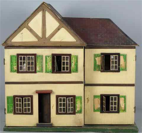 Appraisal: TRIANGTOIS LTD LINES BROTHERS ENGLISH TUDOR DOLLHOUSE WITH ORIGINAL FURNITURE