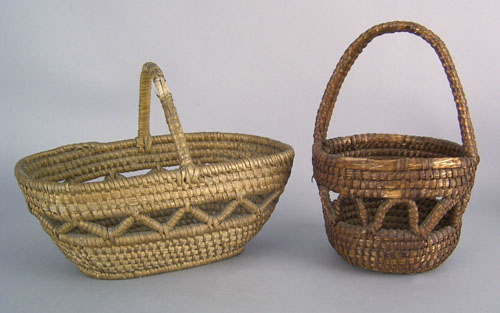 Appraisal: Two Pennsylvania rye straw handled baskets ca with open work