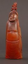 Appraisal: Carved Horn Figure Carved animal horn figure of rounded man