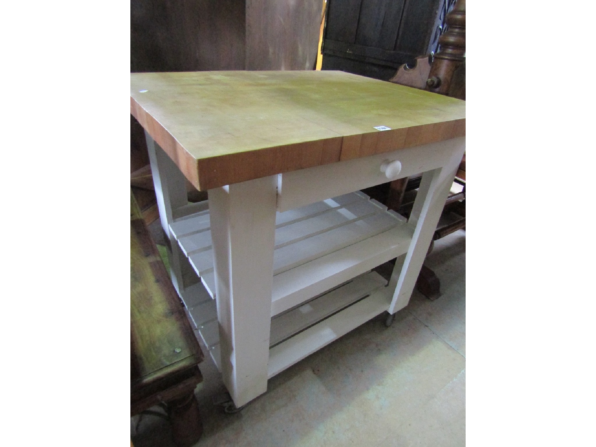 Appraisal: A contemporary three tier kitchen work table trolley the painted