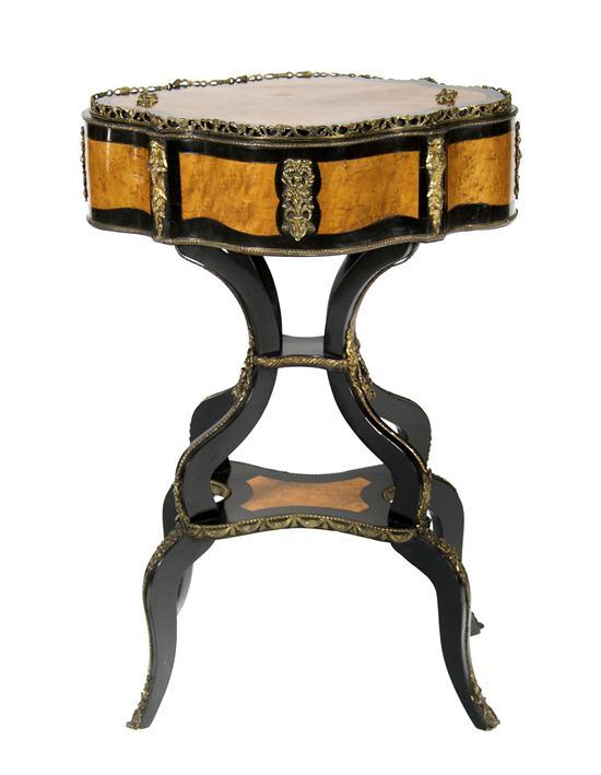 Appraisal: Continental Burlwood Ebonized and Gilt Metal Mounted Jardiniere having a