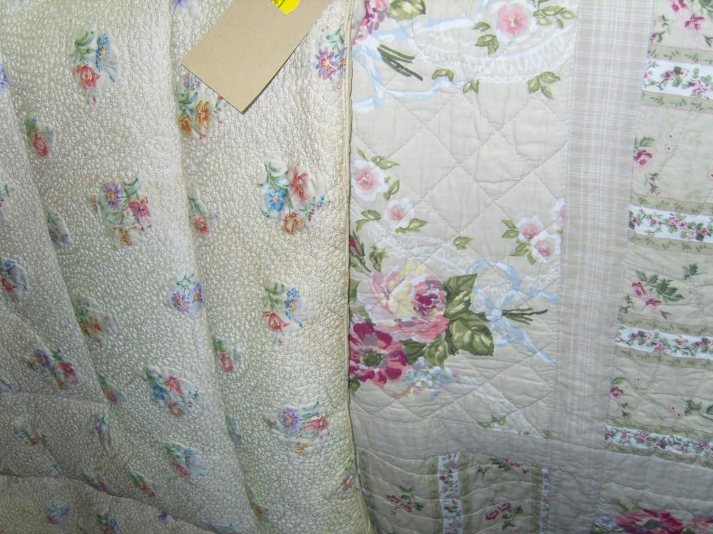 Appraisal: A quilted bedcover with chintz type pink floral decoration on