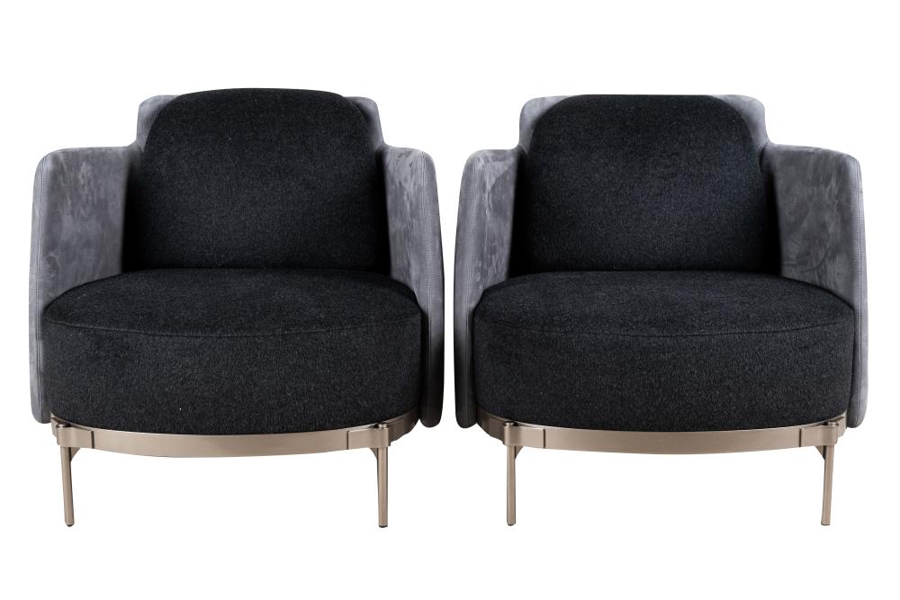 Appraisal: PAIR OF MINOTTI ARMCHAIRS wool leather upholstery Condition with removable