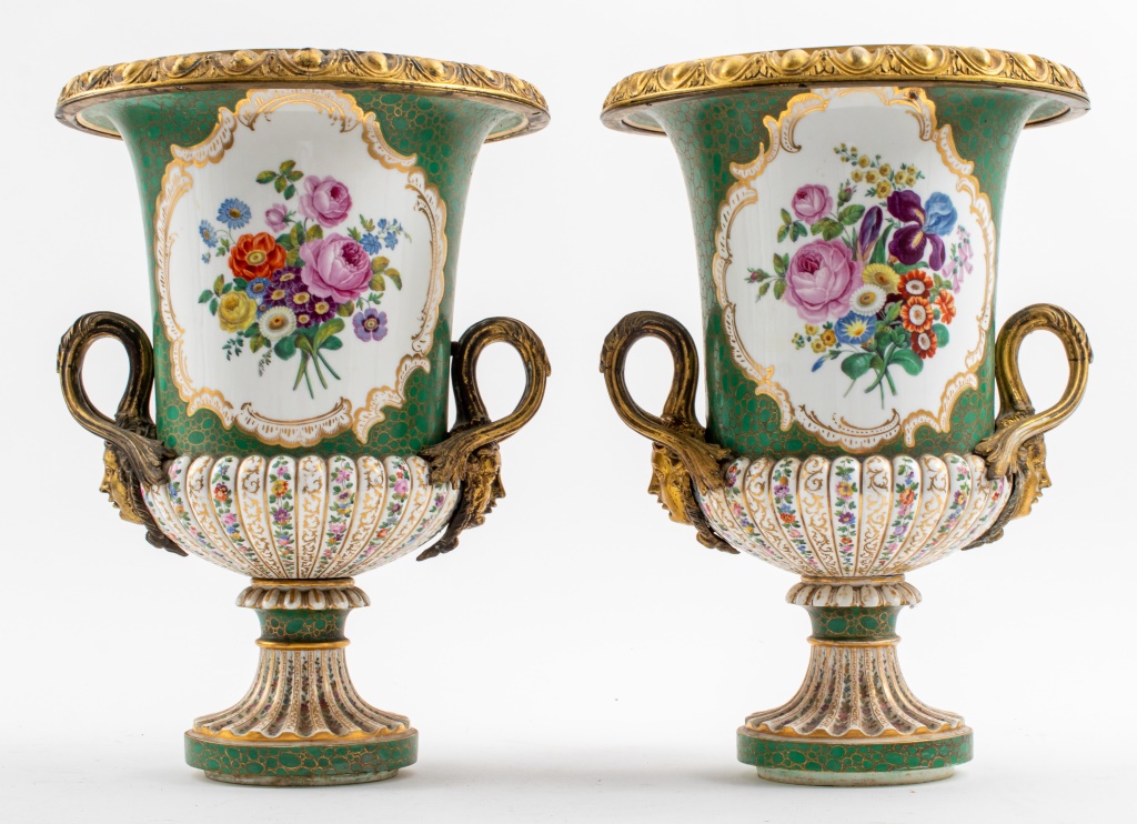 Appraisal: SEVRES STYLE PORCELAIN ORMOLU URN VASES PAIR Pair of Sevres