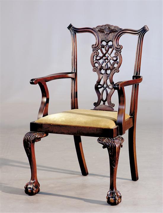 Appraisal: Irish Chippendale style carved mahogany armchair last half th centurywaved