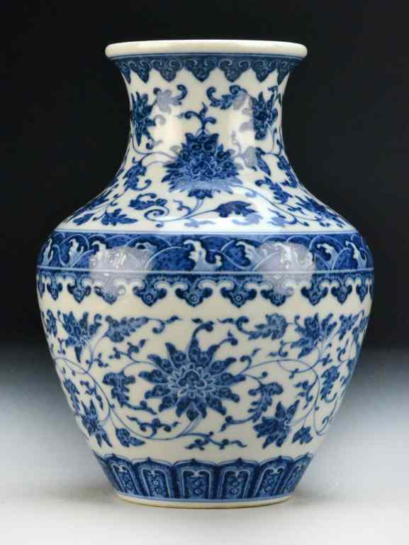 Appraisal: Chinese Blue White Porcelain Urn VaseOf archaic bronze form finely