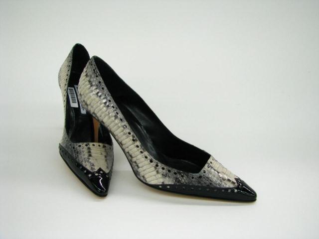 Appraisal: Manolo Blahnik snake skin and black patent leather spectator style