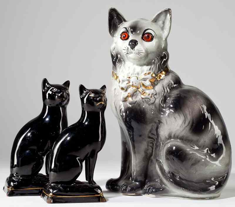 Appraisal: Staffordshire Cat Groupinglate th century to include a large gray