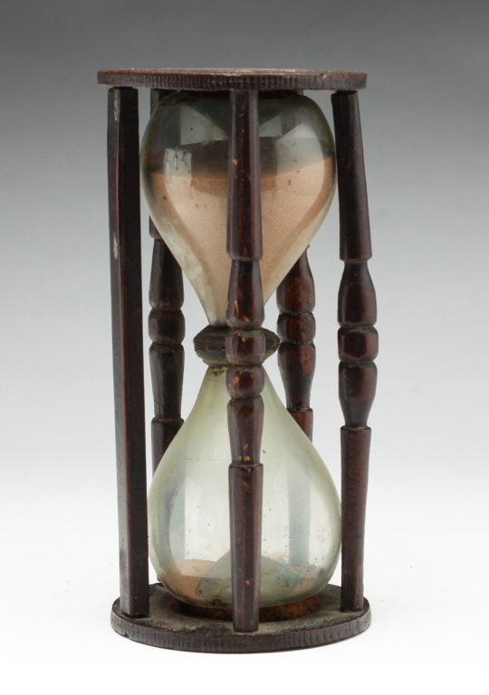 Appraisal: HOURGLASS American or English early th century Blown glass halves