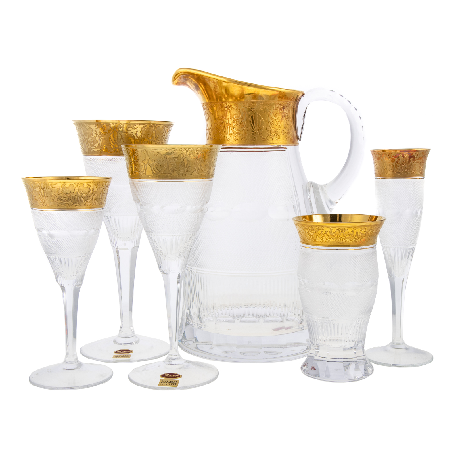 Appraisal: MOSER SPLENDID CRYSTAL STEMWARE SET PITCHER Gold banded cut crystal