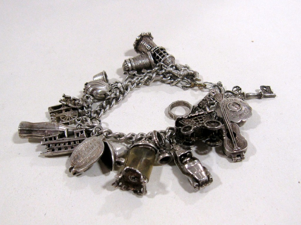 Appraisal: Silver charm bracelet