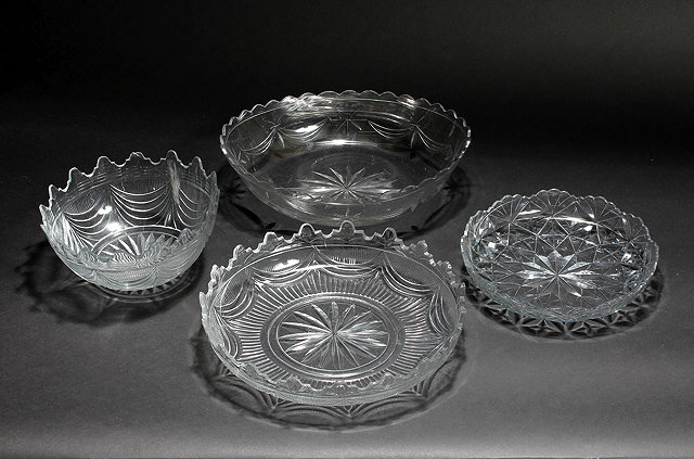 Appraisal: A CUT GLASS BOWL possibly Irish with crenellated top and