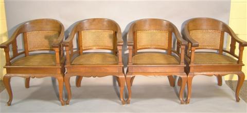 Appraisal: SET OF FOUR INDONESIAN CANE AND TEAK BACK TUB CHAIRS