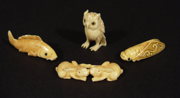 Appraisal: Oriental ivory owl netsuke with glass eyes a pair of