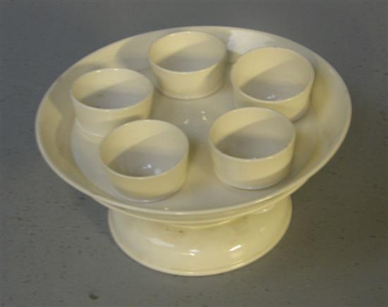 Appraisal: Early th century Leeds creamware egg stand with five eggcups