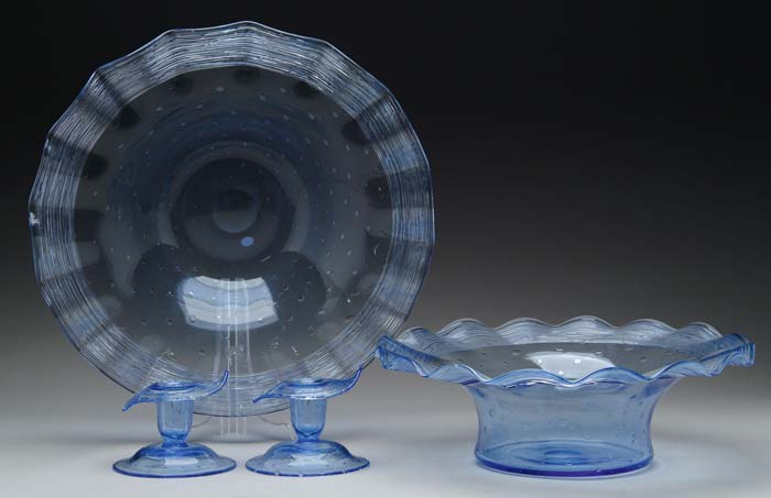 Appraisal: FOUR PIECES OF STEUBEN ART GLASS A pair of -