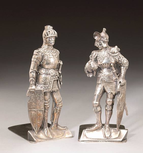 Appraisal: A plated pair of figural bookends Height in