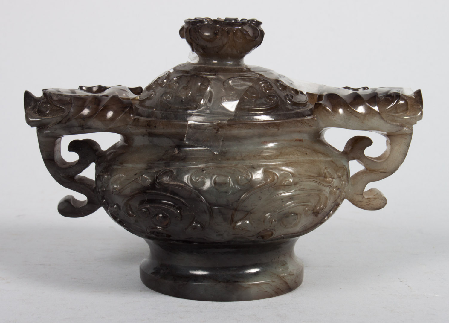 Appraisal: Chinese carved hardstone censer with dragon head handles and bat