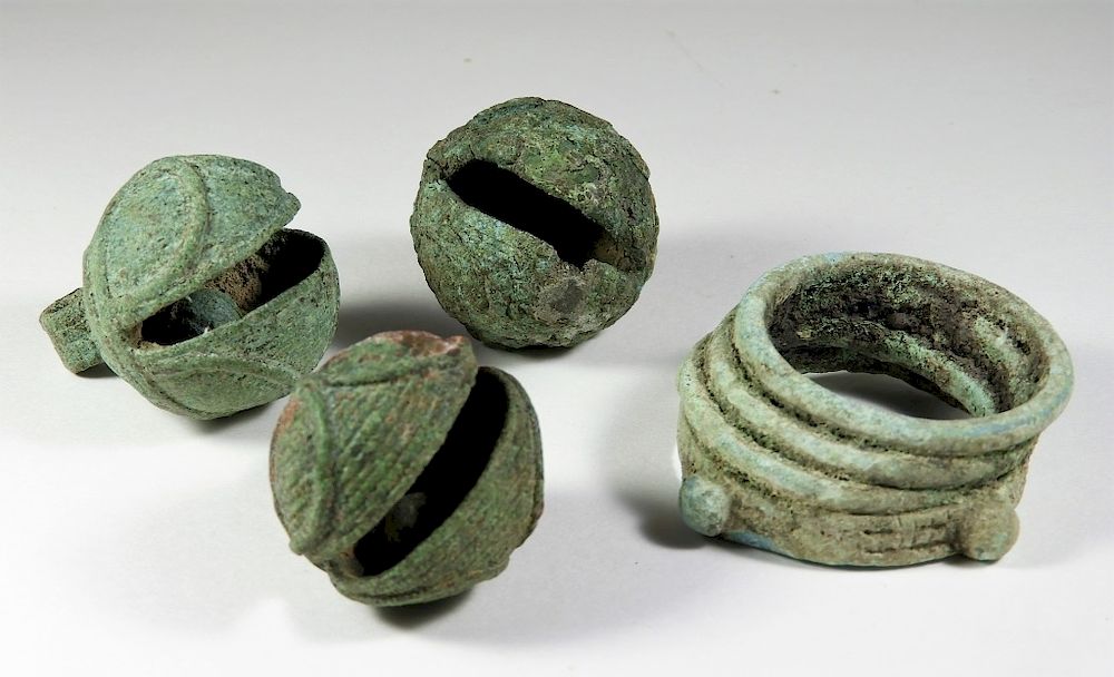 Appraisal: Chinese Han Archaic Bronze Bells Bracelets China Han Dynasty Includes