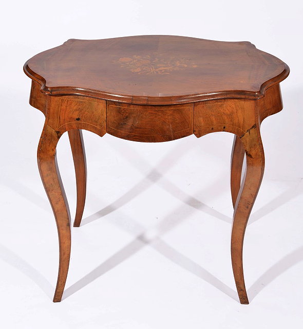 Appraisal: A FRENCH FIGURED WALNUT AND MARQUETRY INLAID SERPENTINE WRITING TABLE