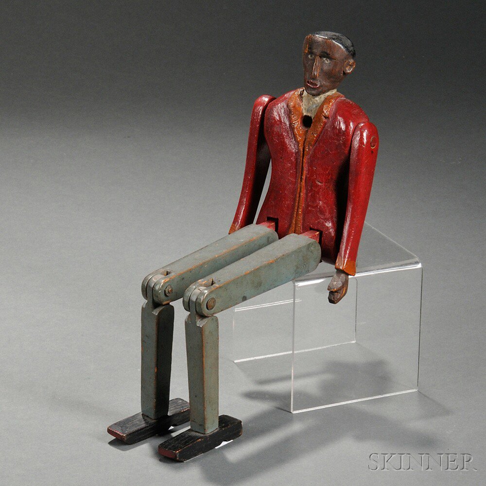 Appraisal: Carved and Painted Articulated Figure of a Black Man America