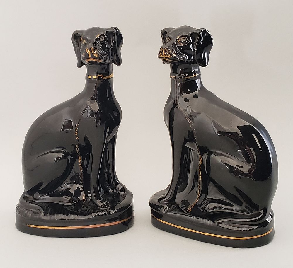 Appraisal: Pair of th Century Black Glazed Staffordshire Whippets Pair of