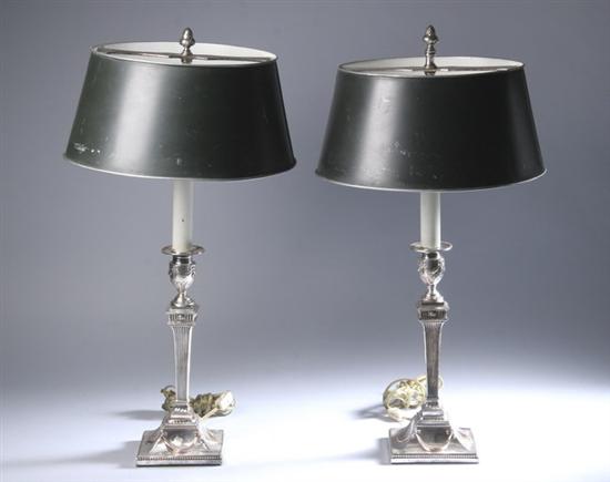 Appraisal: PAIR ADAMS-STYLE SHEFFIELD PLATE CANDLESTICKS th century Modelled as lamps