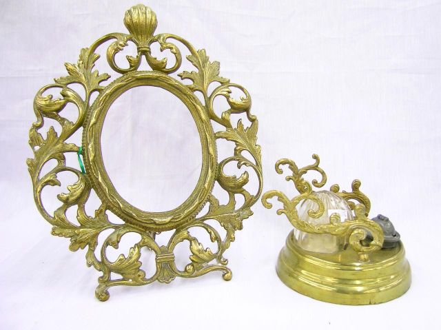 Appraisal: Art Nouveau brass plated picture frame with scroll motif selling