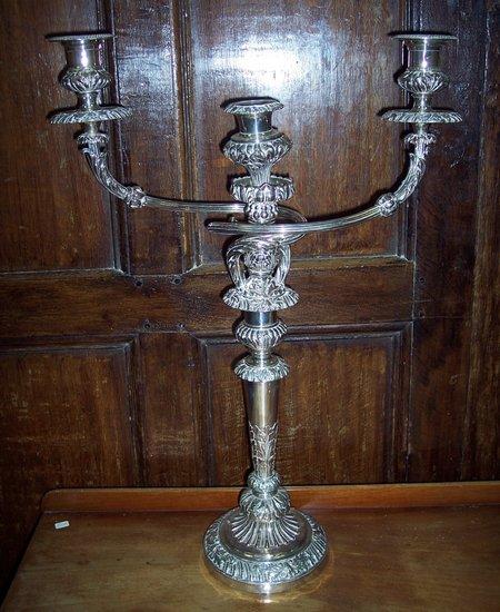 Appraisal: A Sheffield plate two-branch three-light candelabrum with acanthus cladding and