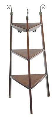 Appraisal: Marine Interest A late Victorian walnut triangular three tier etagere