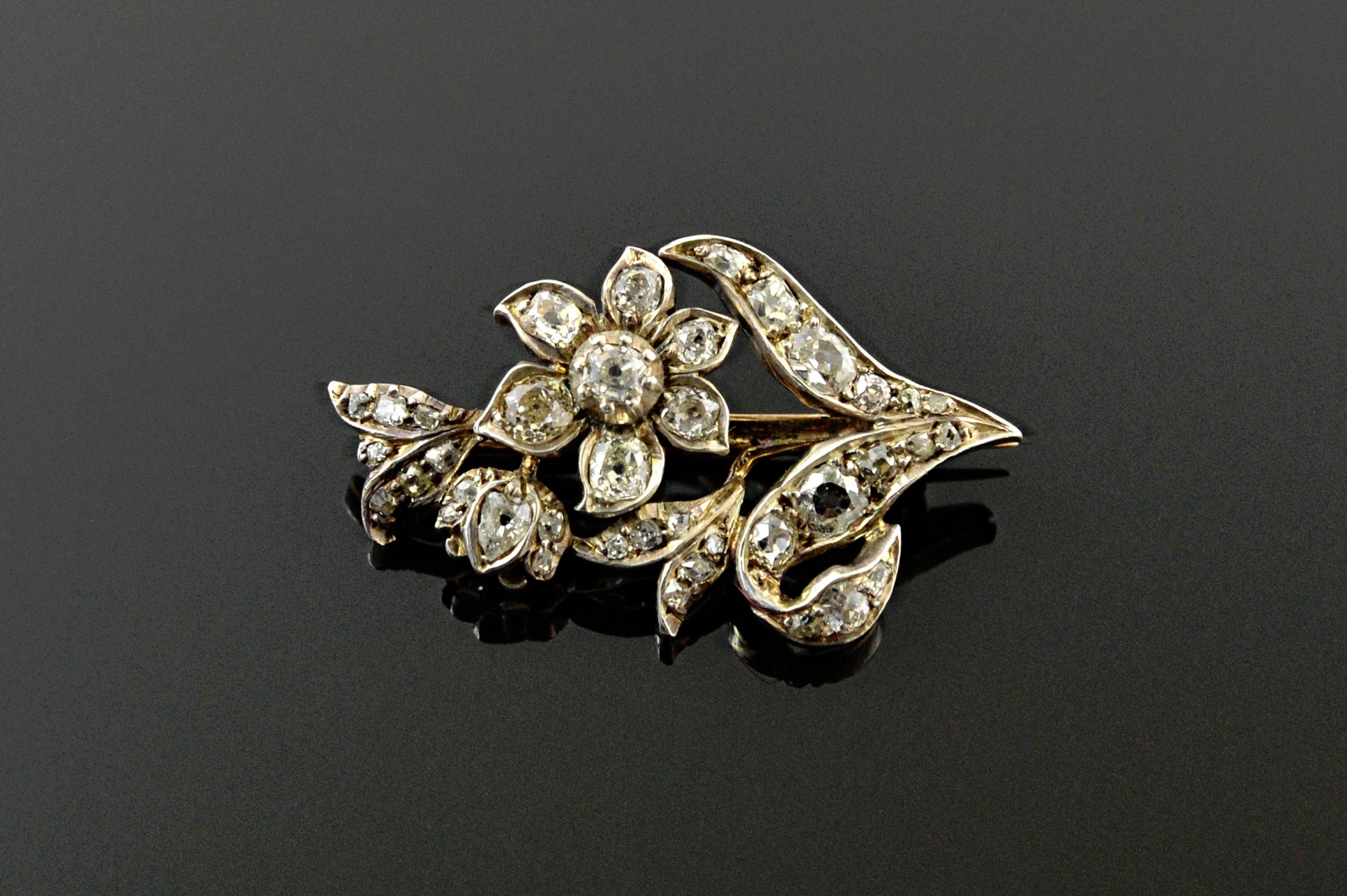 Appraisal: A Victorian diamond flower spray brooch set throughout with old-cut