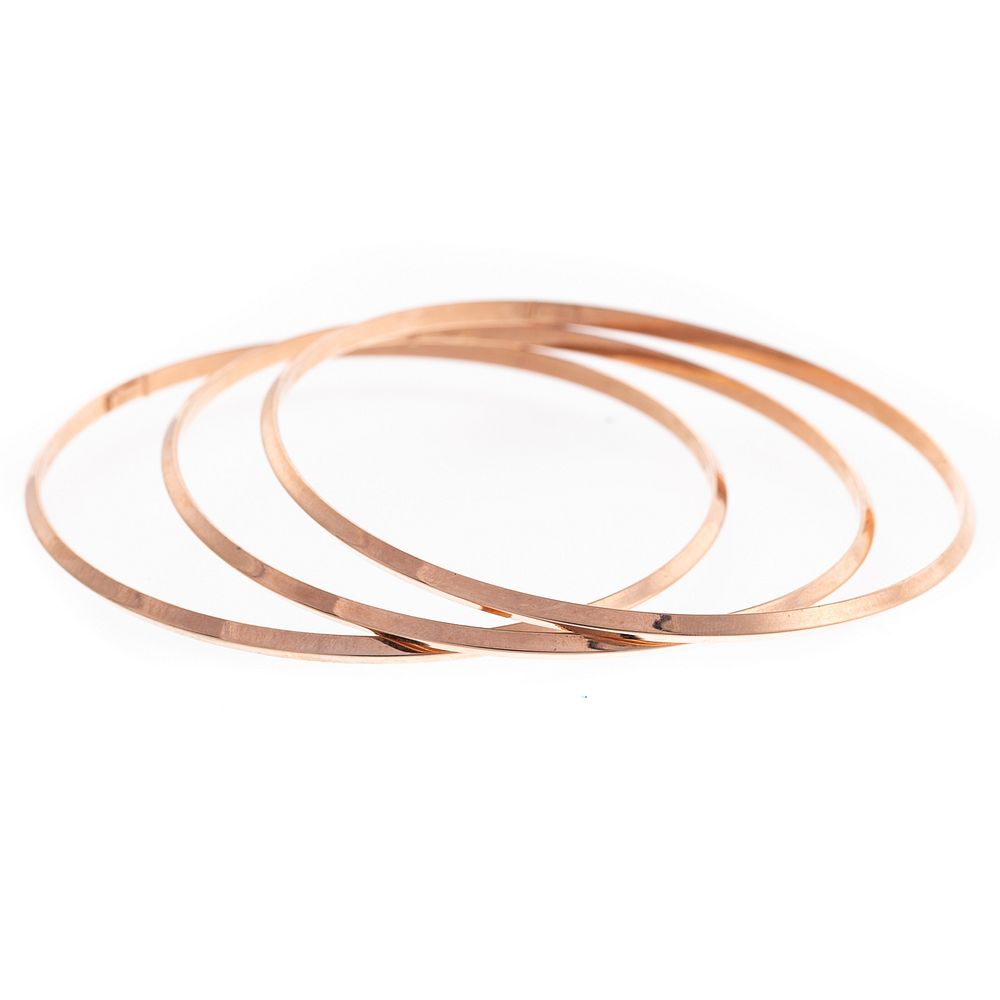 Appraisal: A Trio of K Rose Gold Bangles Three K rose