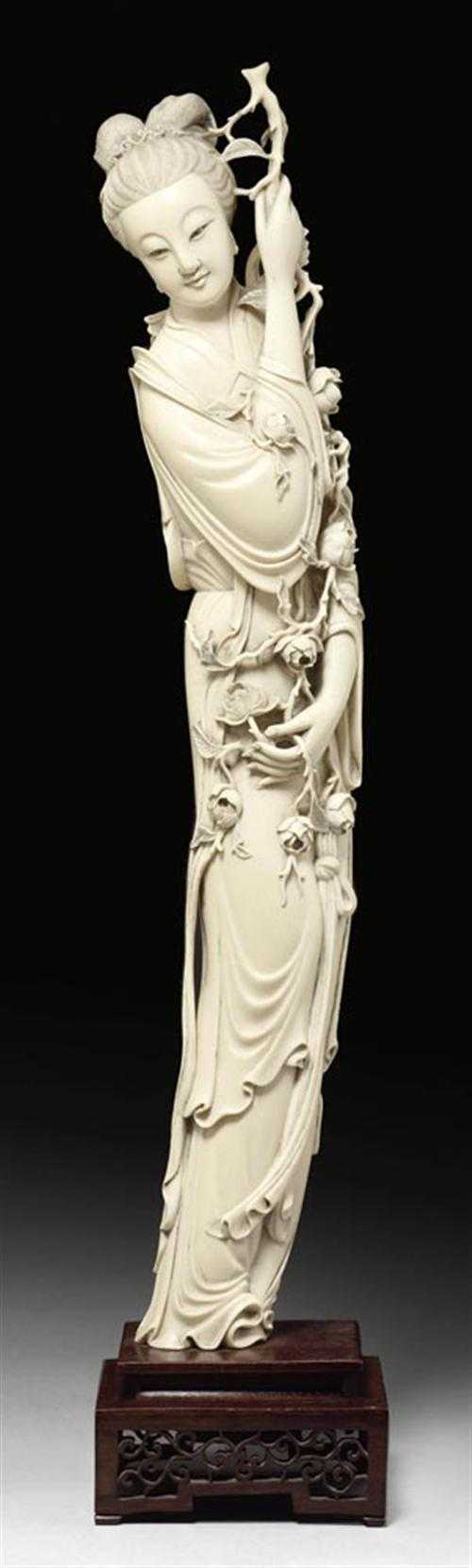 Appraisal: LARGE IVORY CARVING OF A LADY China circa H cm