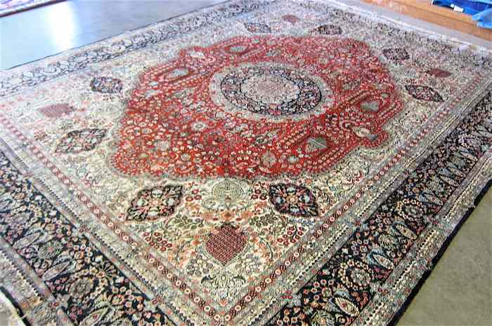 Appraisal: HAND KNOTTED ORIENTAL CARPET Indo-Persian faux silk floral and central