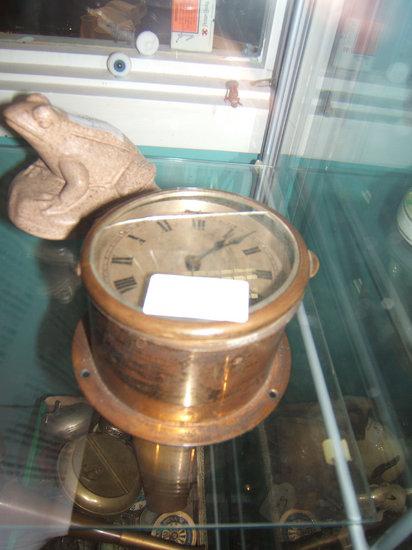 Appraisal: A small sized ship's bulkhead timepiece with brass case the