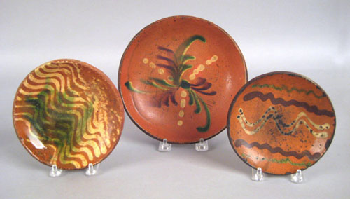 Appraisal: Three redware plates th c dia dia and dia