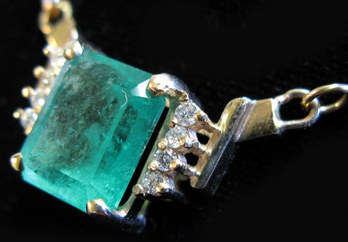 Appraisal: EMERALD DIAMOND AND FOURTEEN KARAT GOLD NECKLACE the pendant is