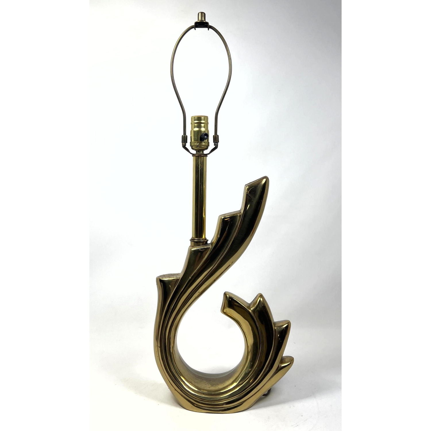 Appraisal: Gold Tone Modernist Swoosh Flourish Table Lamp Cardin style Dimensions